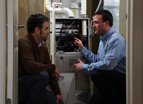 repairman and homeowner
